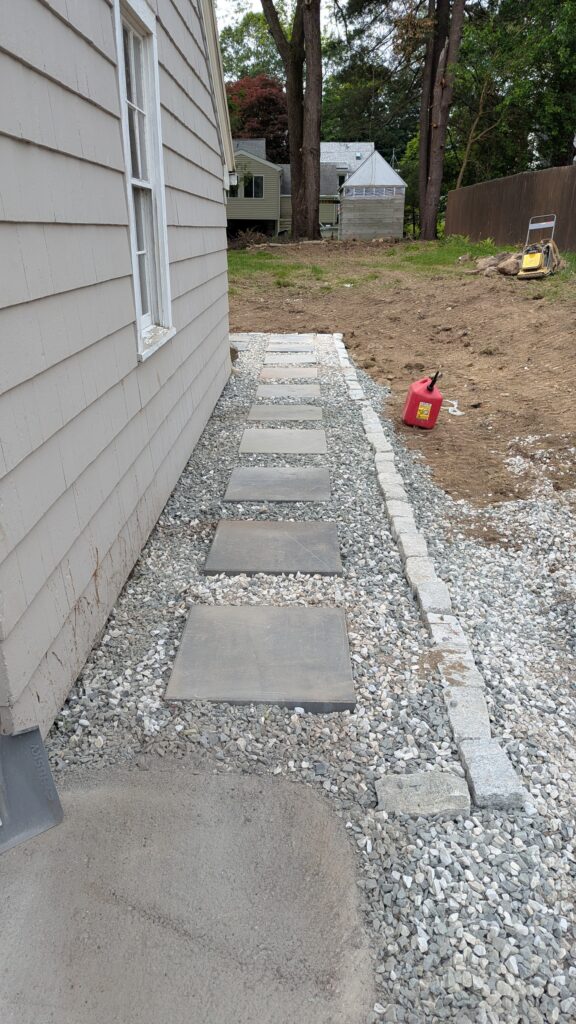 Stone walkway with gravel border