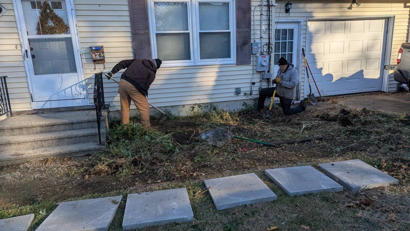 Landscape cleanup and stepping stone installation